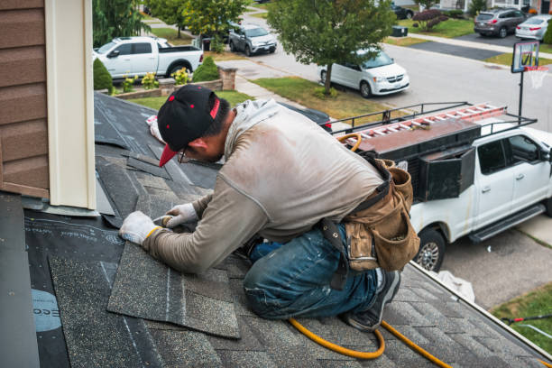 Professional Gutter Repair And Installation technician working in Hope, IN